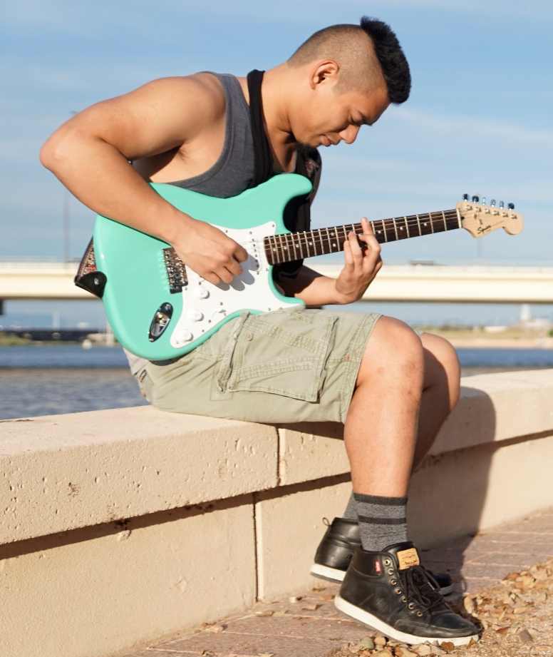 Don playing a Stratocaster